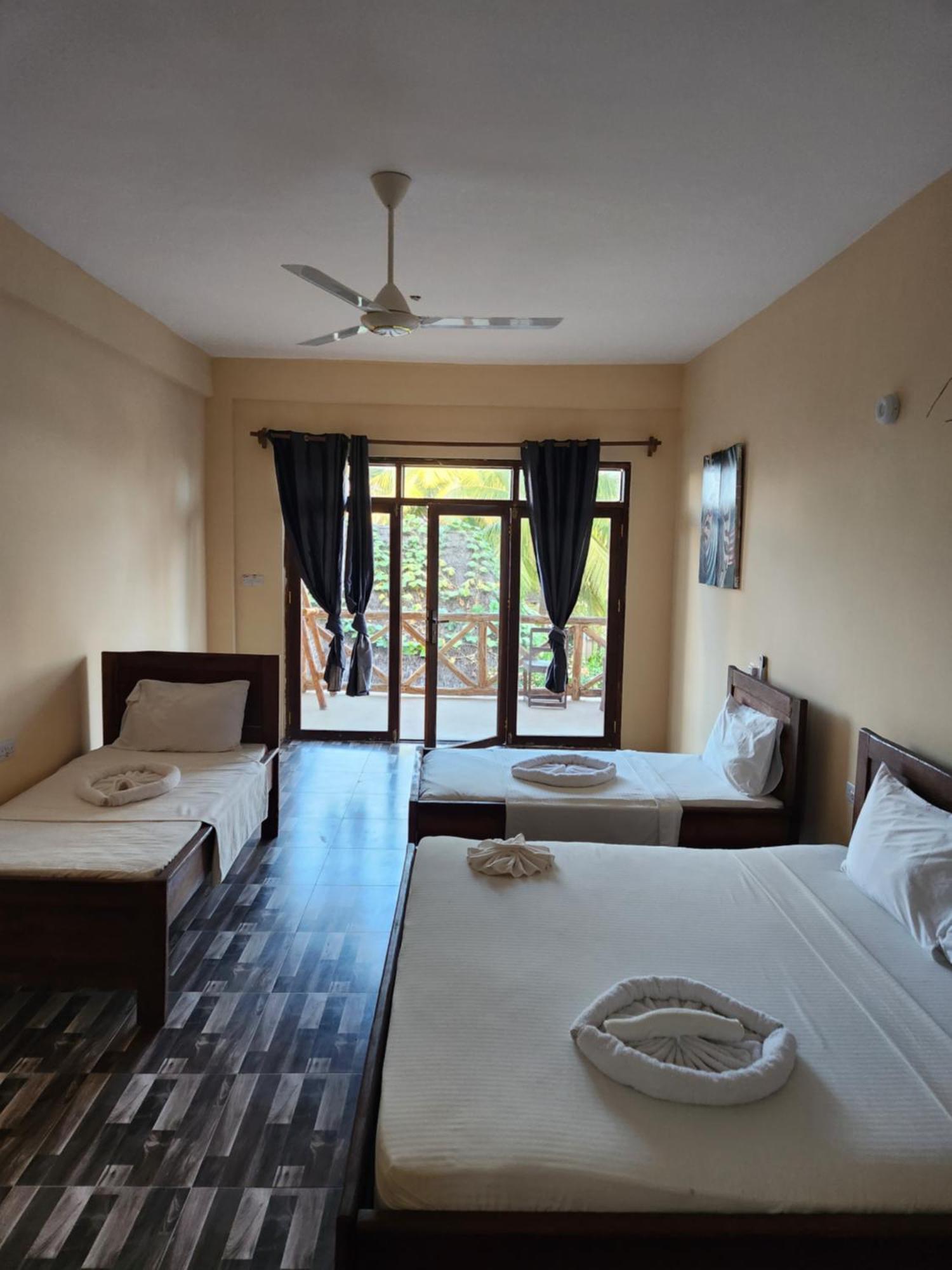Hotel Two Palms à Jambiani  Extérieur photo